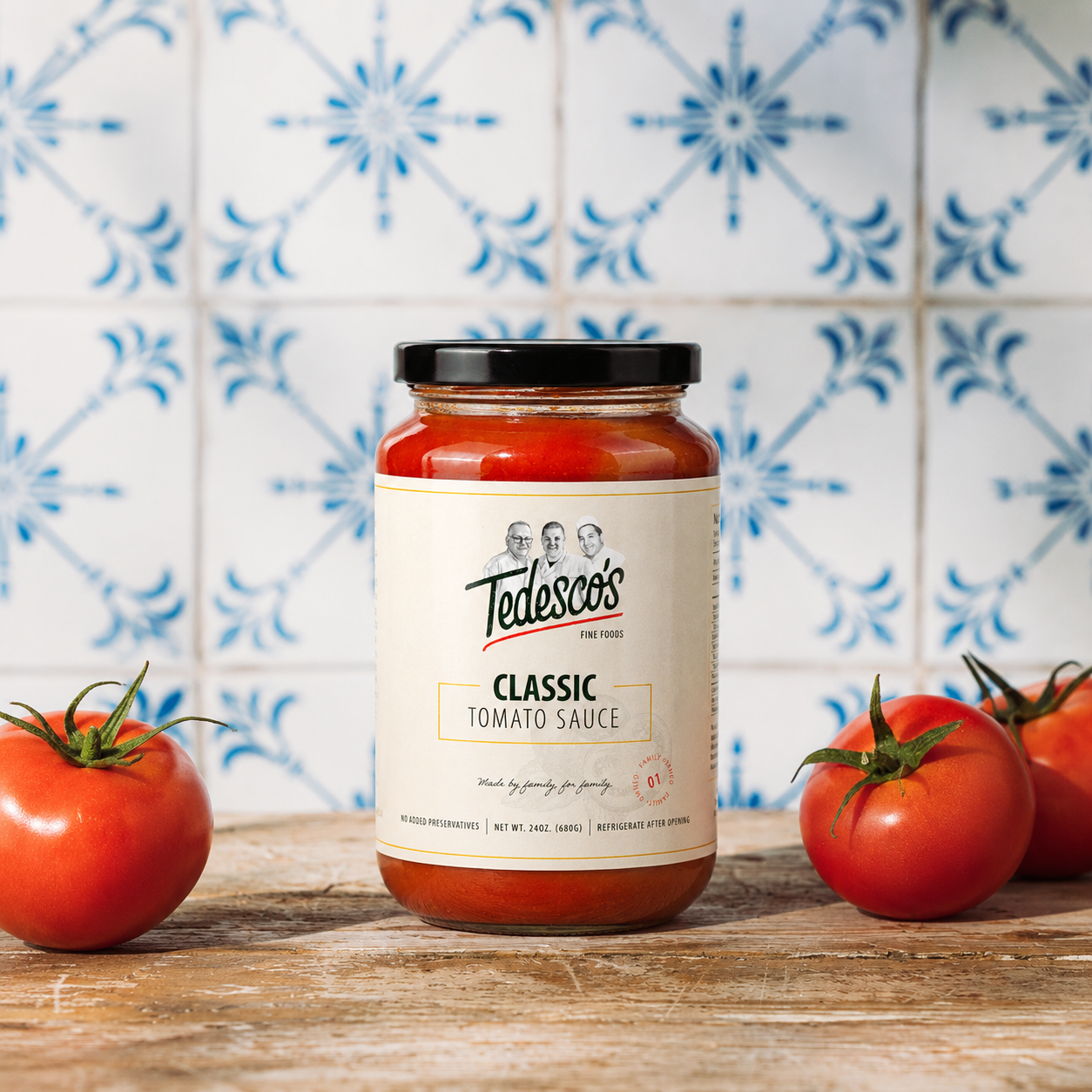 Jar of Tedesco's Classic Tomato Sauce with fresh tomatoes